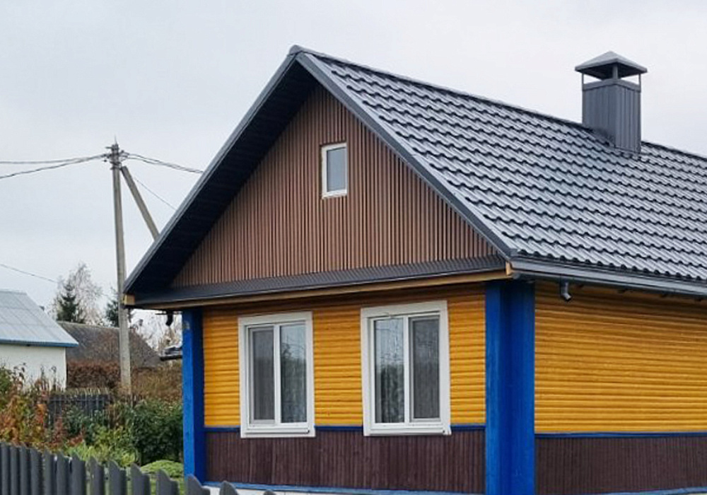 3D-панели ДПК на фасаде частного дома