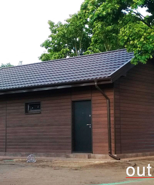 Вентфасад гаража из фасадной доски ДПК Outdoor