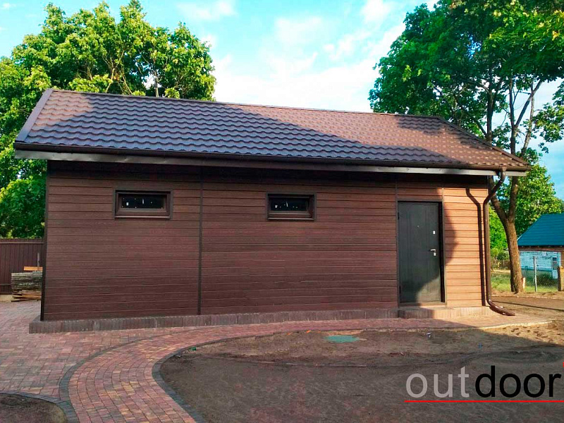 Вентфасад гаража из фасадной доски ДПК Outdoor