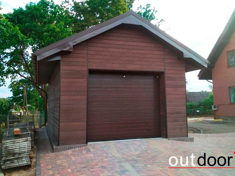 Вентфасад гаража из фасадной доски ДПК Outdoor