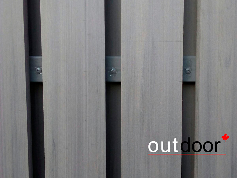 Заполнение пролетов кирпичного забора  доской ДПК Outdoor .